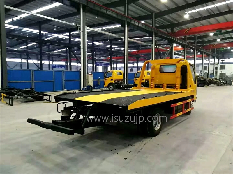 ISUZU ELF 100P flat bed tow truck