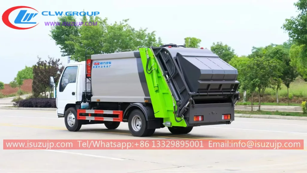 Isuzu 6m3 rear loading refuse compactor truck photo