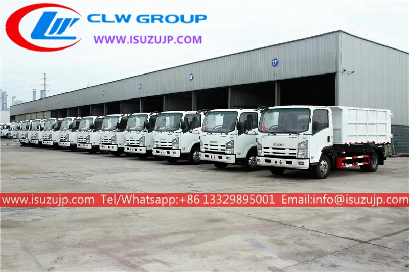 11 sets of Isuzu NMR 6 cube dumpster truck exported to Dubai