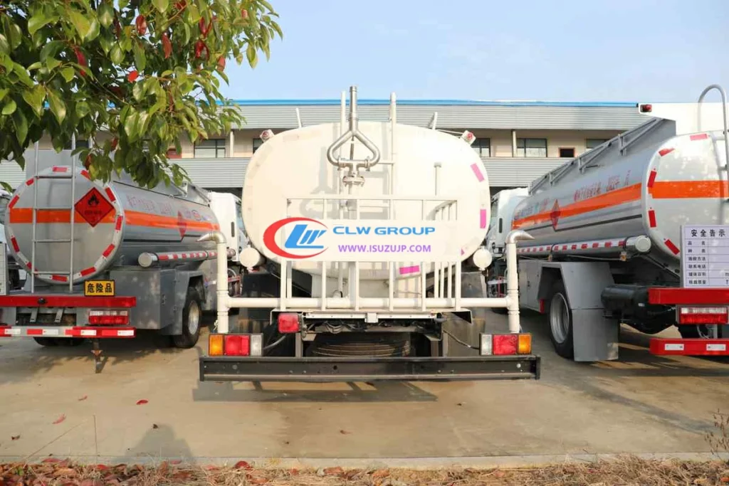 Isuzu NMR 2000 gallon water delivery truck