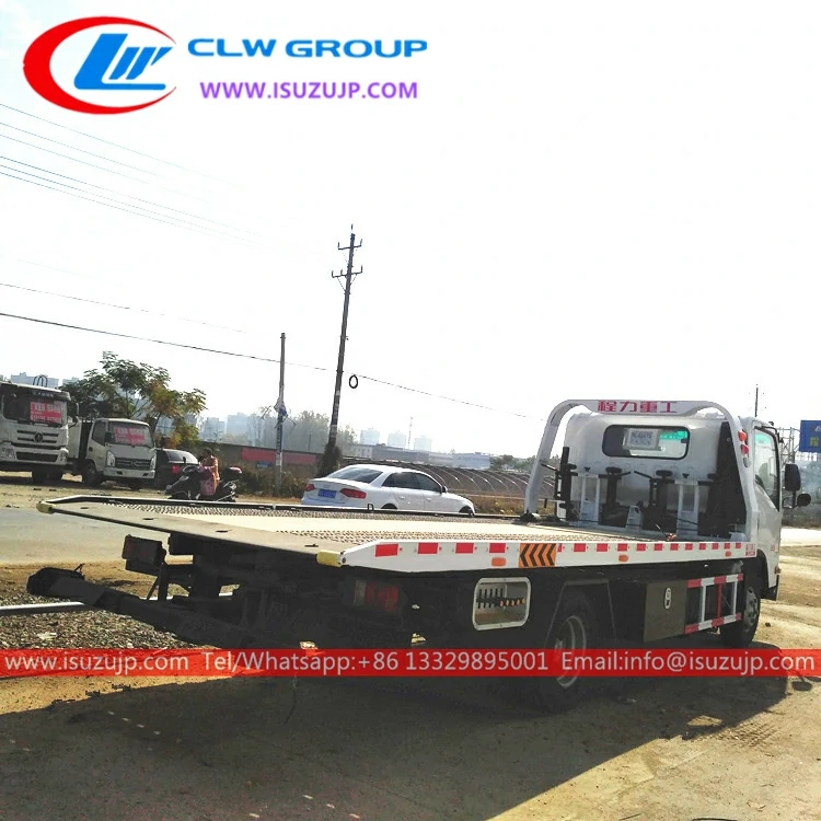 Isuzu NPR one to two flatbed tow vehicle